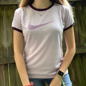 purple nike shirt